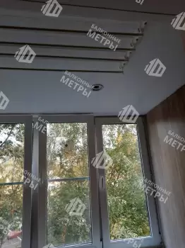 Отделка балкона под ключ ламинатом и натяжным потолком Отделка балкона под ключ ламинатом и натяжным потолком